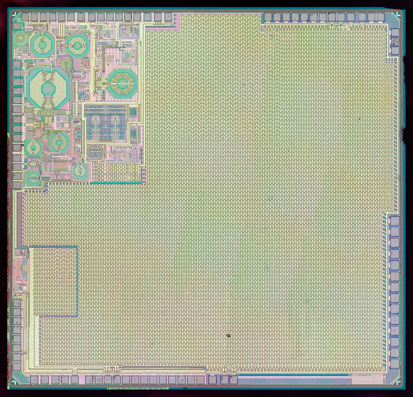 A die shot of the ESP32 chip, its radio blocks and memory arrays visible in green and violet